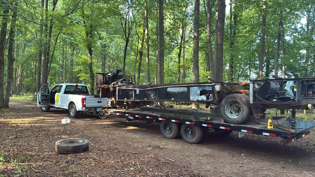 Truck loaded with hauled-away junk